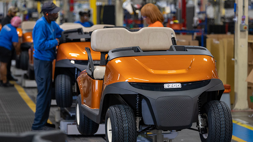 E-Z-GO vehicles on a factory assembly line.
