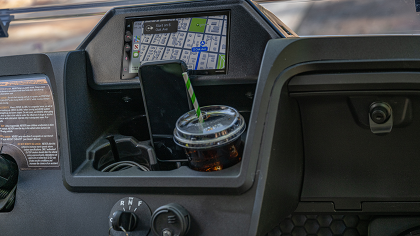 The dash and infotainment system as part of the E-Z-GO Freedom RXV.