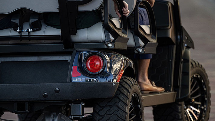 The rear end of an E-Z-GO Liberty LSV vehicle.