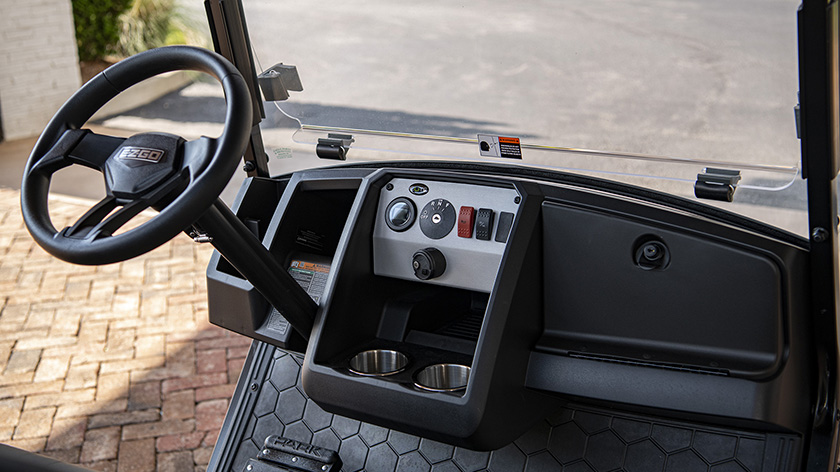 An inside view of the spacious interior of an Express S2 golf cart.