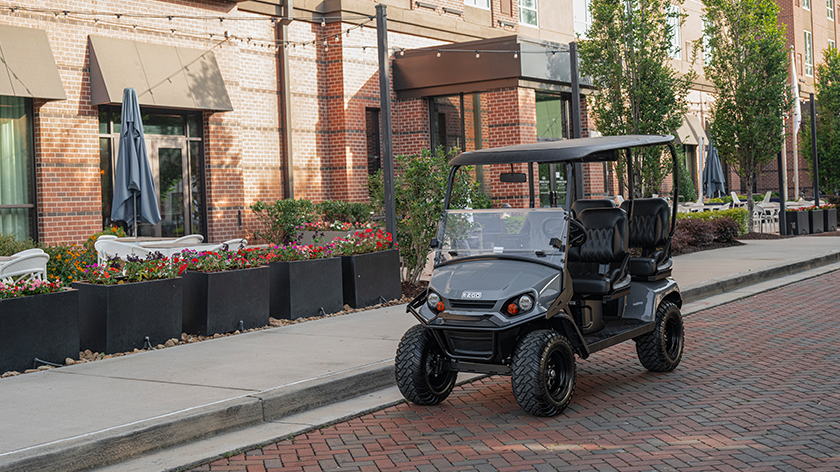 MY26 Liberty sitting in front of a neighborhood shop