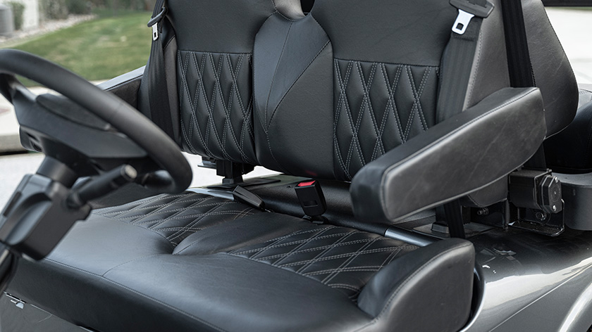Now introducing E-Z-GO's all-new luxury seating. The automotive-style seating, with flip down armrests and sculpted foam seats, introduce a new level of elegance to every ride.
