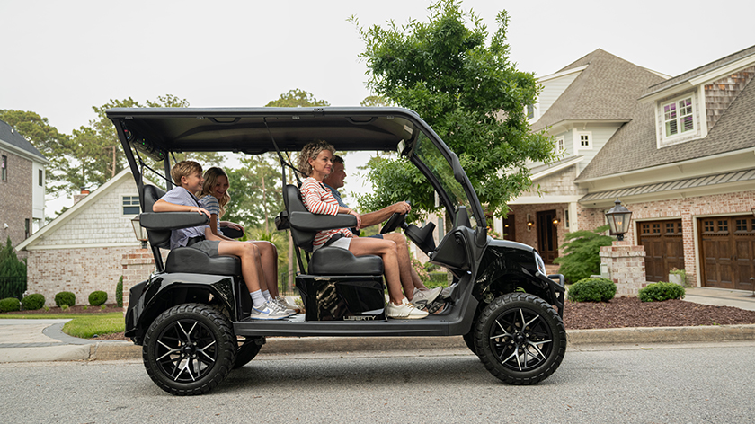 E-Z-GO Liberty 4F electric golf cart with four forward facing seats