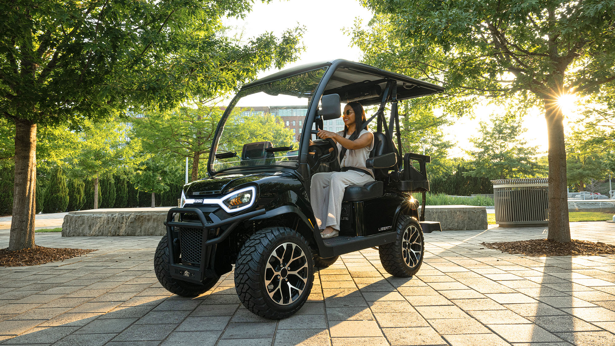 E-Z-GO Liberty 4 with 2 forward 2 backward facing seats, available in gas or electric powertrains. 