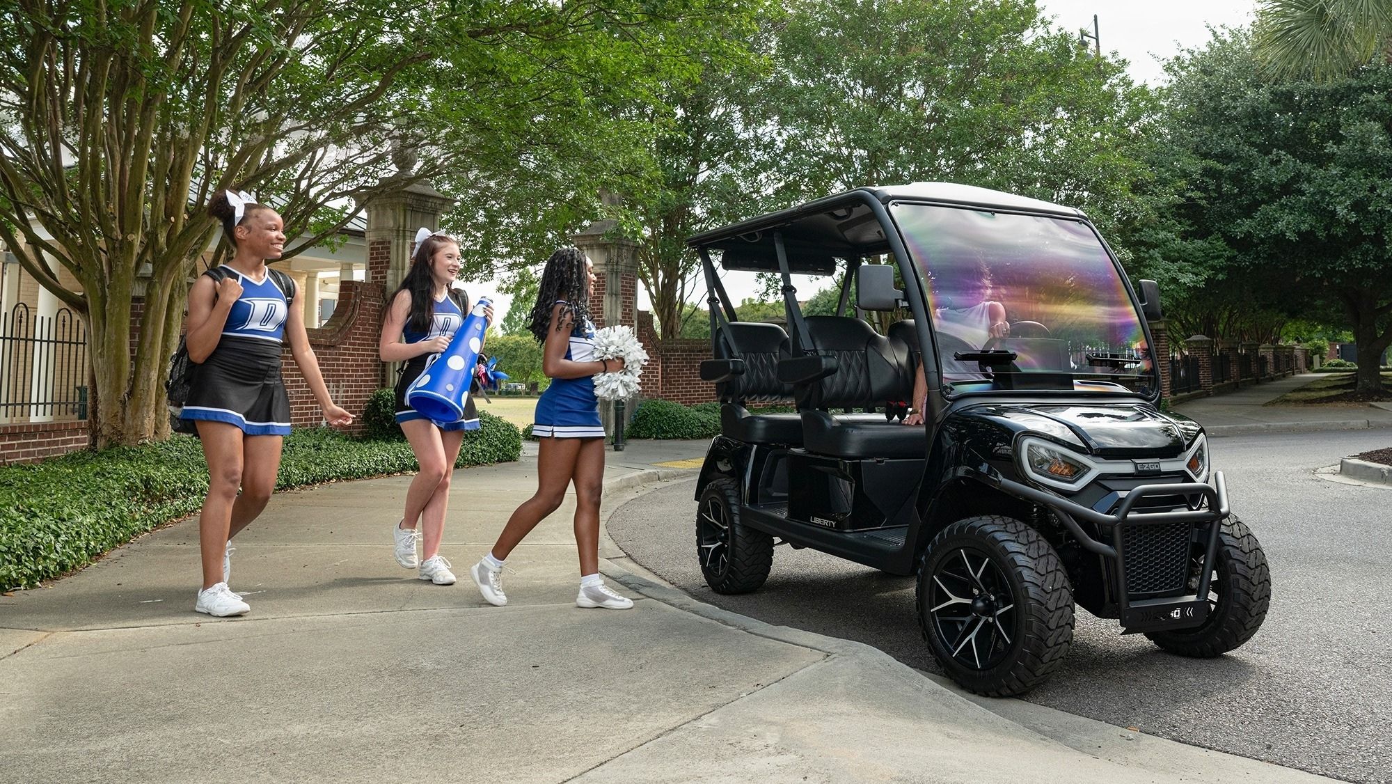 E-Z-GO Liberty 4F electric golf cart with four forward facing seats