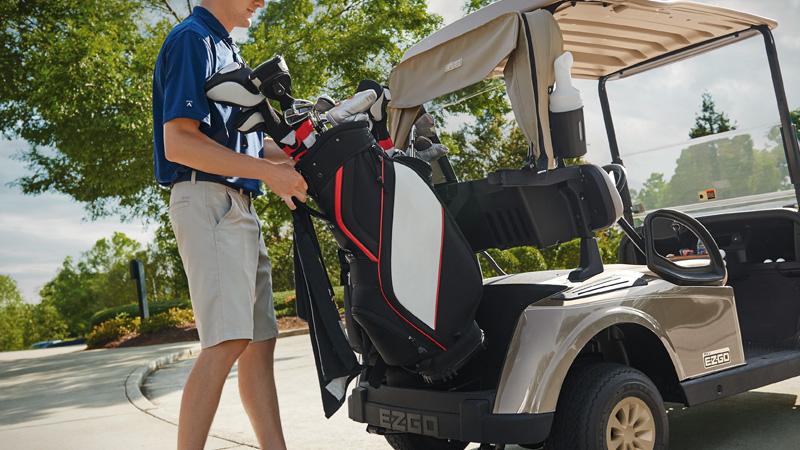 EZGO RXV gas golf cart with golf bag-well for club storage.