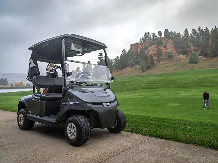 E-Z-GO vehicle in front of golf course