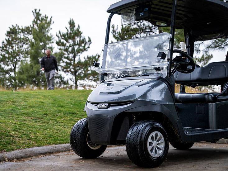 The frontend of an E-Z-GO golf cart.